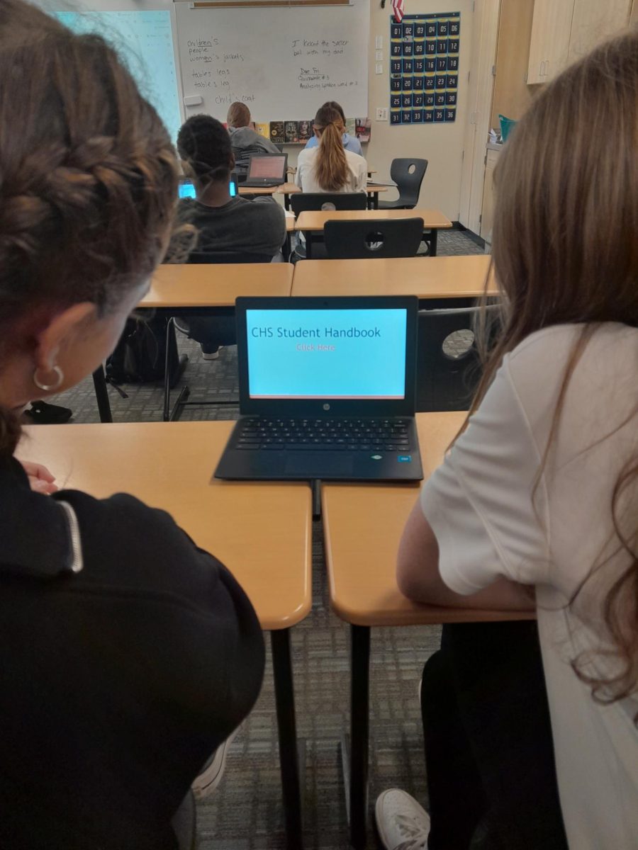 Students review the handbook, preparing for their handbook test next Wednesday in advisory.