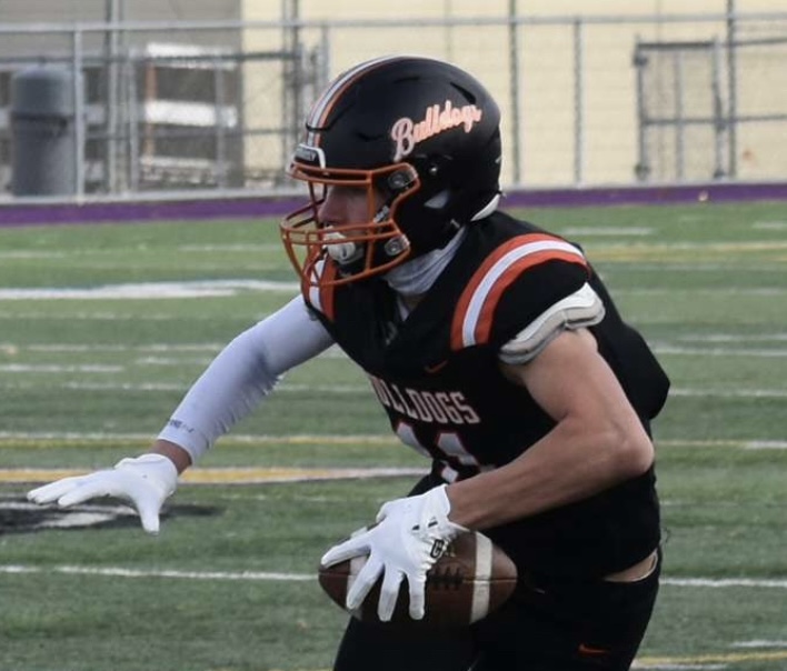 Eyes locked on the end zone: Captain Spies turning last year's records into this year's championship drive.