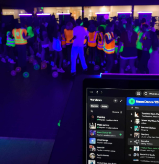 Students at Cashmere High School jump to the song “Fireball” in their neon colors after the football game was cancelled on September 5th.
