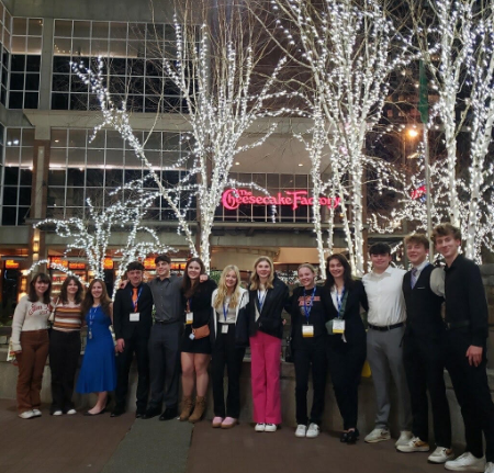Members of CHS DECA 2025 posing for a picture in Bellevue, WA