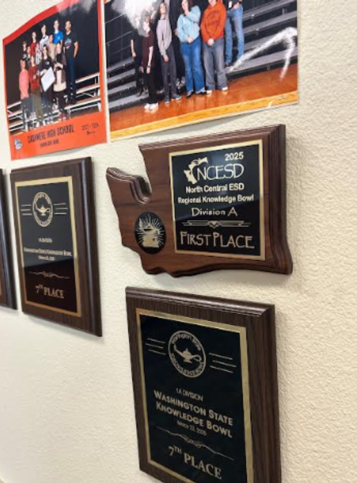 Knowledge bowl trophies and plaques from past competitions are proudly displayed in Mr. Valerie’s room, showing the accomplishments of the knowledge bowl team over the years