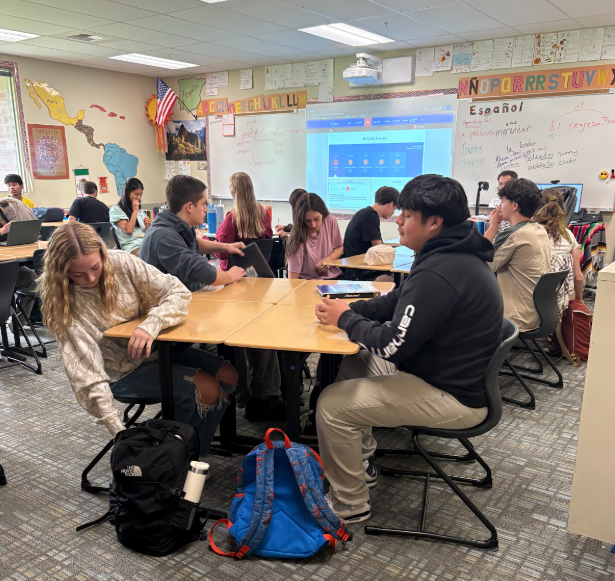 Theiss works with students to create fun activities for Hispanic Heritage Month.