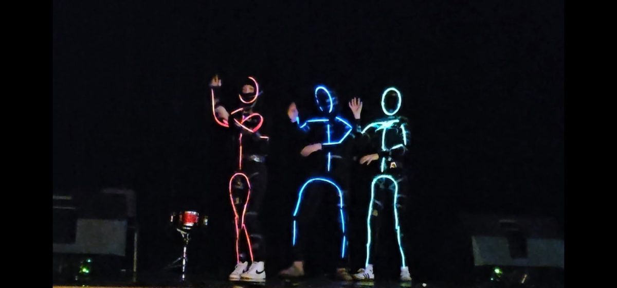 The Glow Getters preform an interpretive dance this Wednesday at the talent show.
