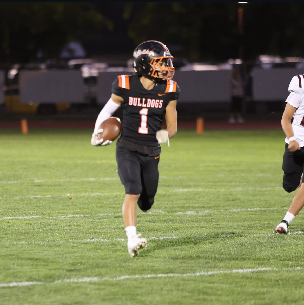 Senior Isaac Zavala runs down the sideline as the Bulldogs role past the Wahluke Warriors in their most recent home game.