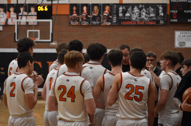 Cashmere Boys Varsity Basketball in a timeout during the 2024-25 season.