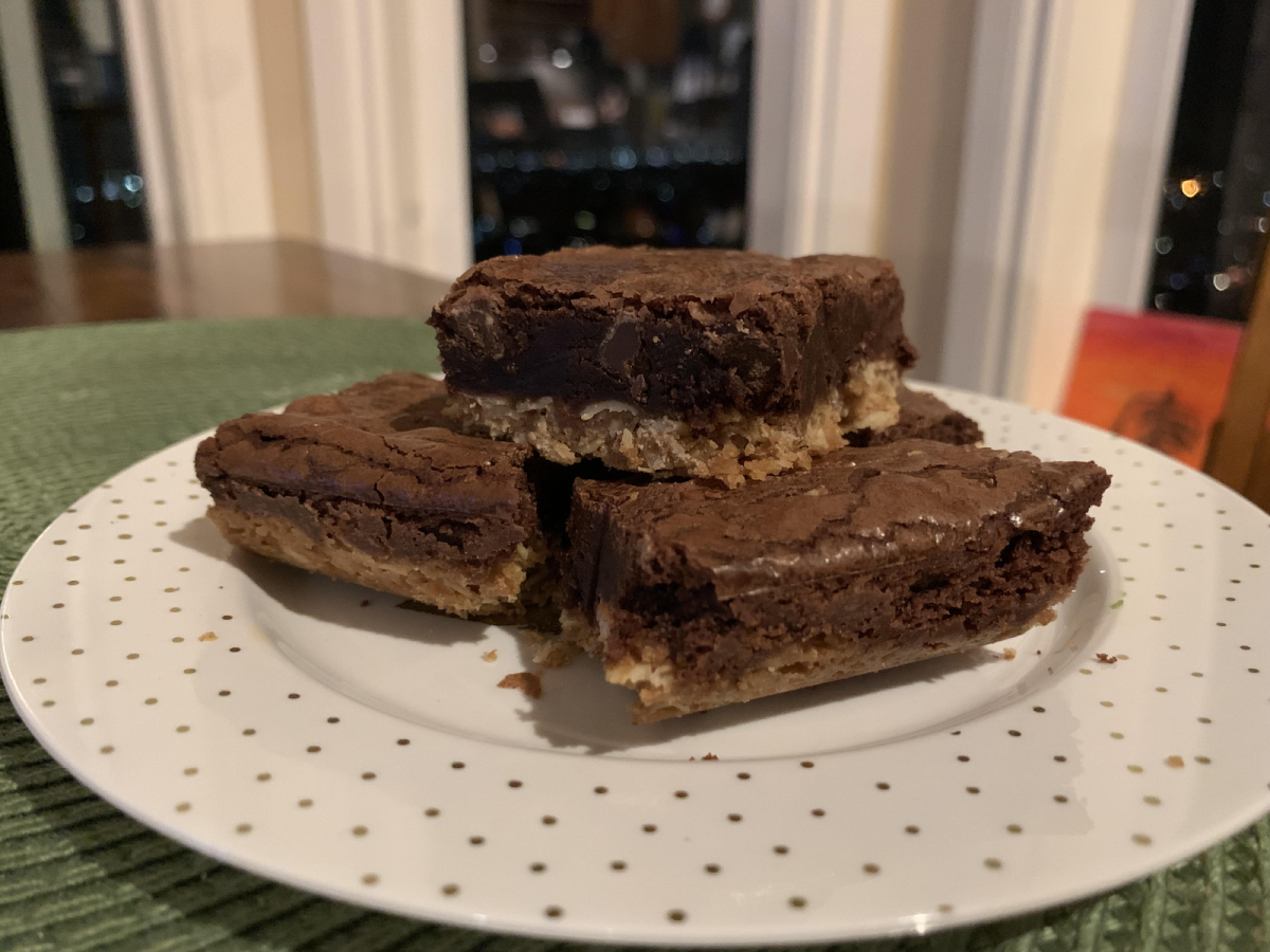 Rosella’s brownies are served on a beautiful plate, showcasing their oatmeal at the bottom and their brownie mix on top.