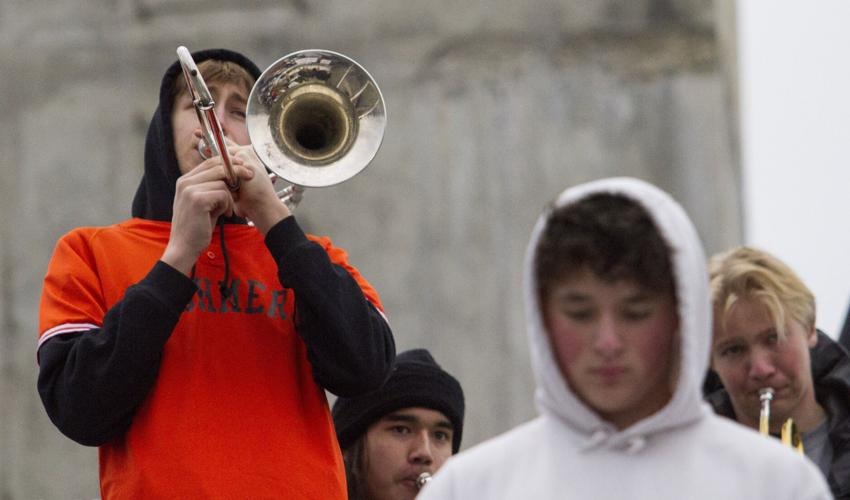 Kamren Meloy plays trombone in the CHS pep band at Apple Bowl Stadium