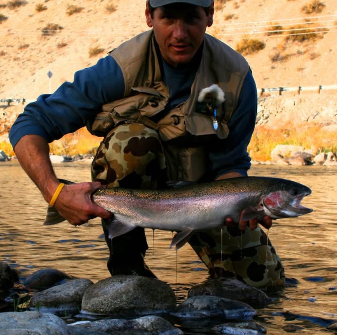 Mr. Michael holding a fish he caught in Cashmere